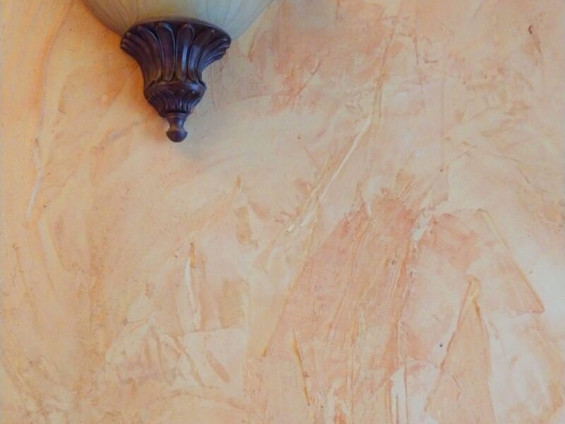 Malayan buff pigment mixed with white plaster wall design