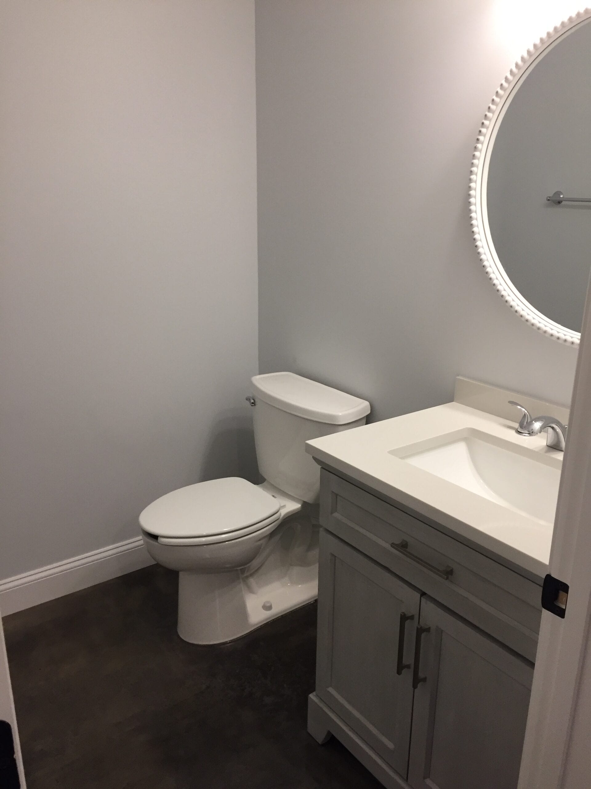 Bathroom floor with two coats of Charcoal AcquaTint and ProWax polish