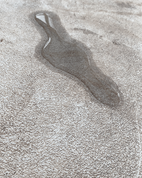 Water on sealed concrete surface after one hour