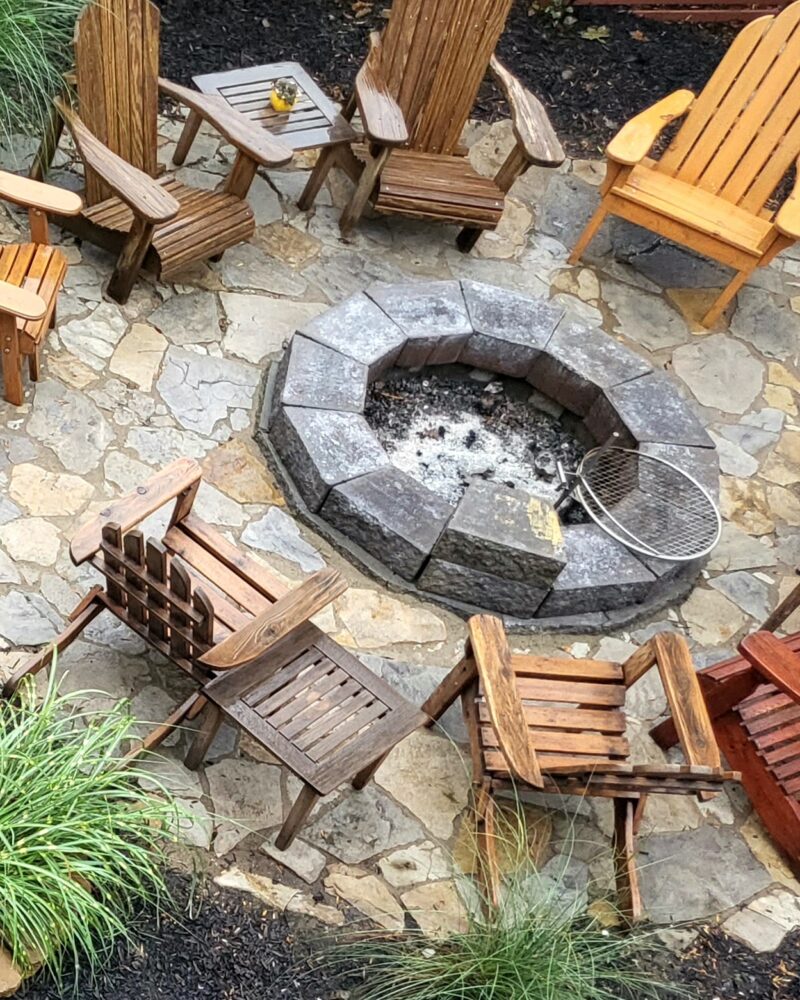 Stained natural stone patio with gray concrete stain