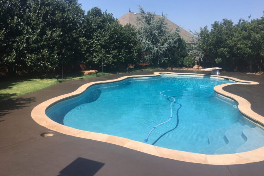 After: A stunning poolside oasis brought back to life with Resurface-It concrete overlay and Chocolate EasyTint