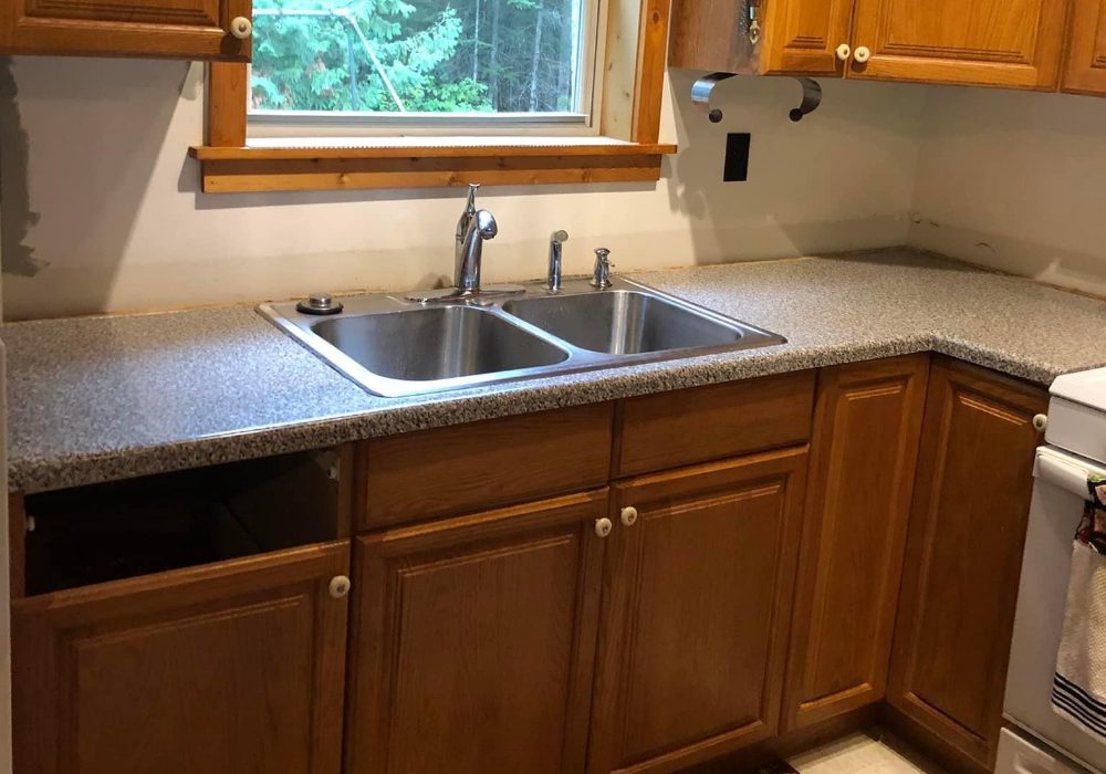 A Formica countertop in a kitchen, prior to the application of Everstain acid stain