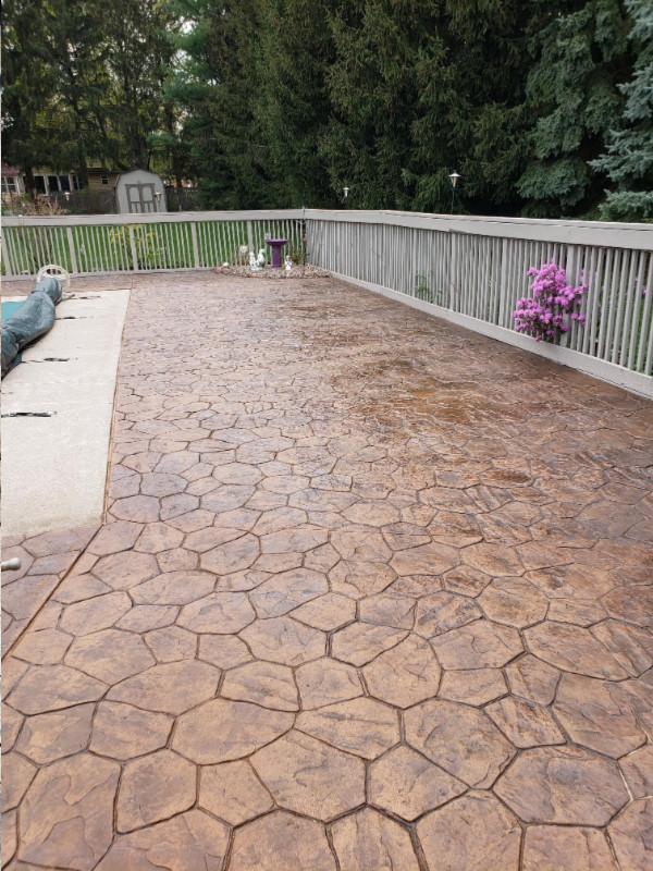 Post-stain stamped concrete pool deck, now revitalized with Cumin Antiquing Stain and Satin EasySeal