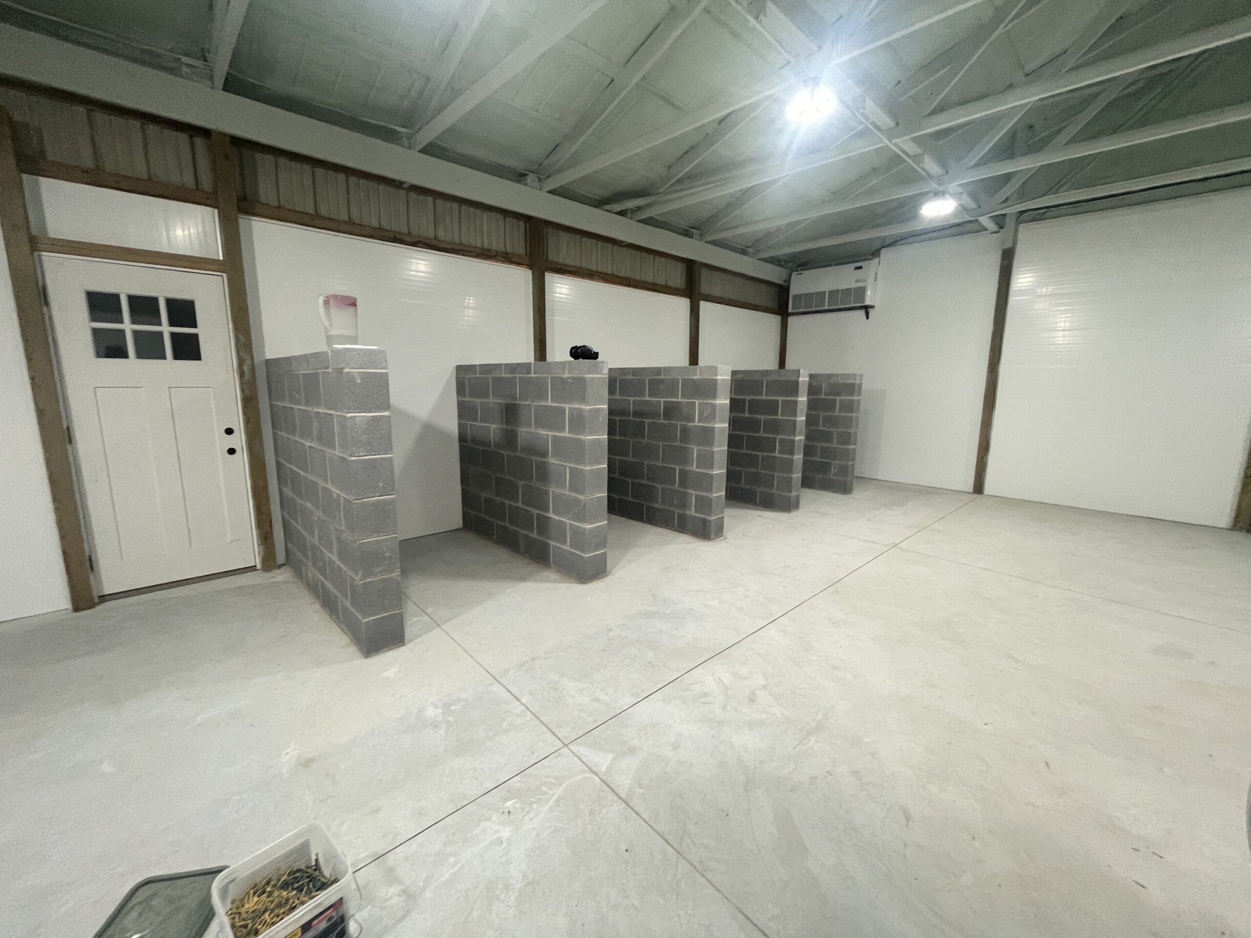 Etched concrete floor in the barn, prepped and ready for acid staining