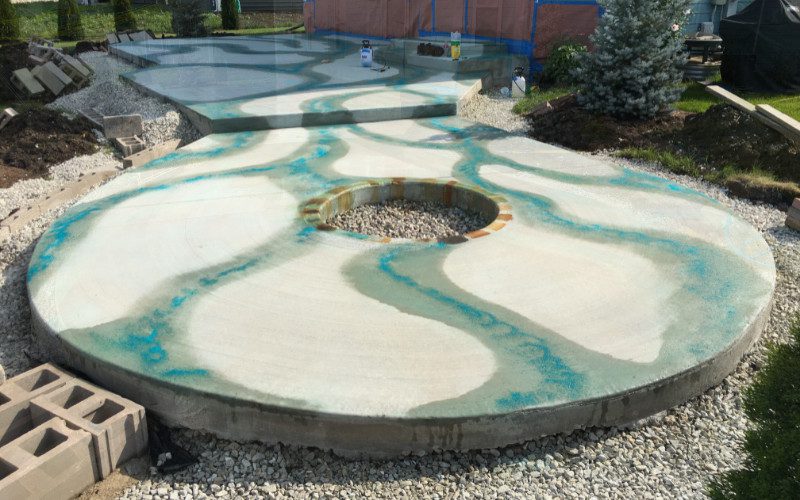 Miracle-Gro is used to create streaks of intense blue by mixing it with Seagrass acid stain color