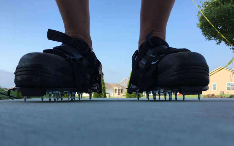 Wearing spiked shoes to prevent leaving footprints or tracking the stain where it’s not wanted.