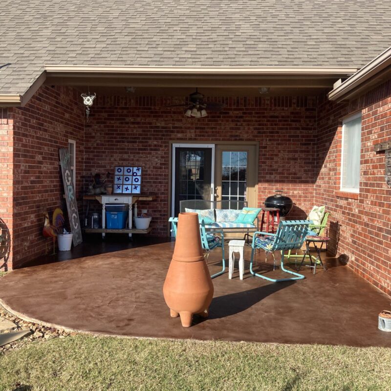 An after photo of a covered concrete patio stained with Chocolate EasyTint™