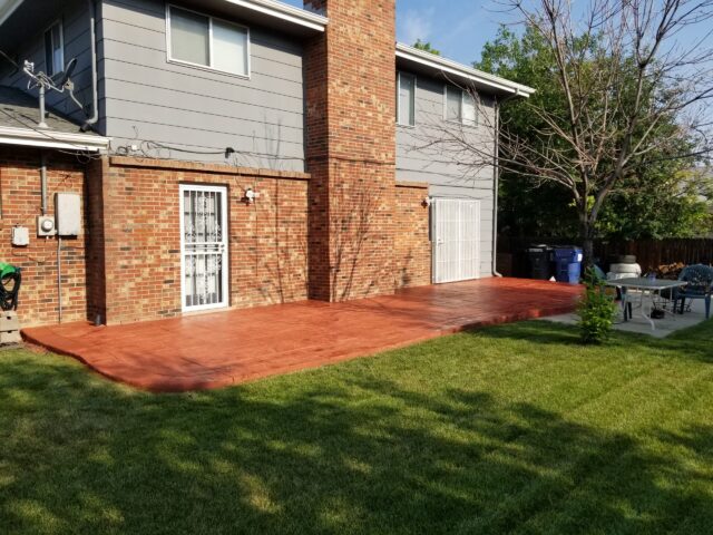 Crimson Antiquing Stain on Hand Troweled Faded Concrete Patio