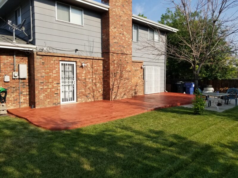Crimson Antiquing Stain on Hand Troweled Faded Concrete Patio