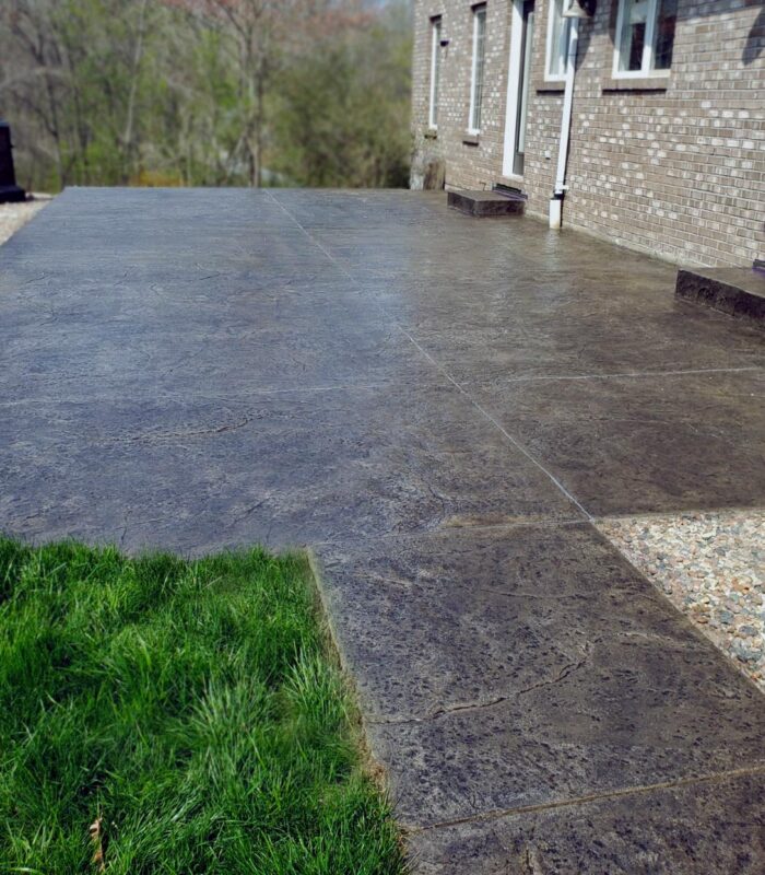 Black stained salt finish concrete patio