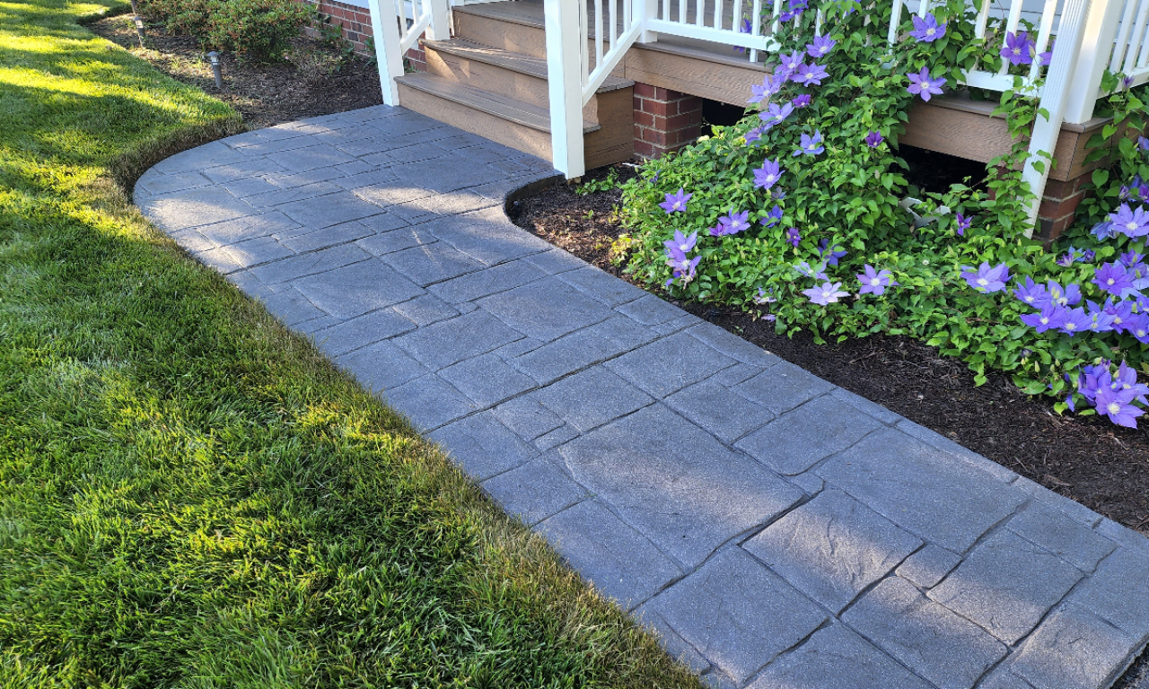 Charcoal Antiquing stain on stamped concrete walkway