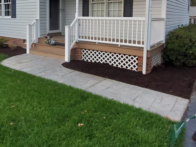 20-year-old stamped concrete sidewalk before renovation