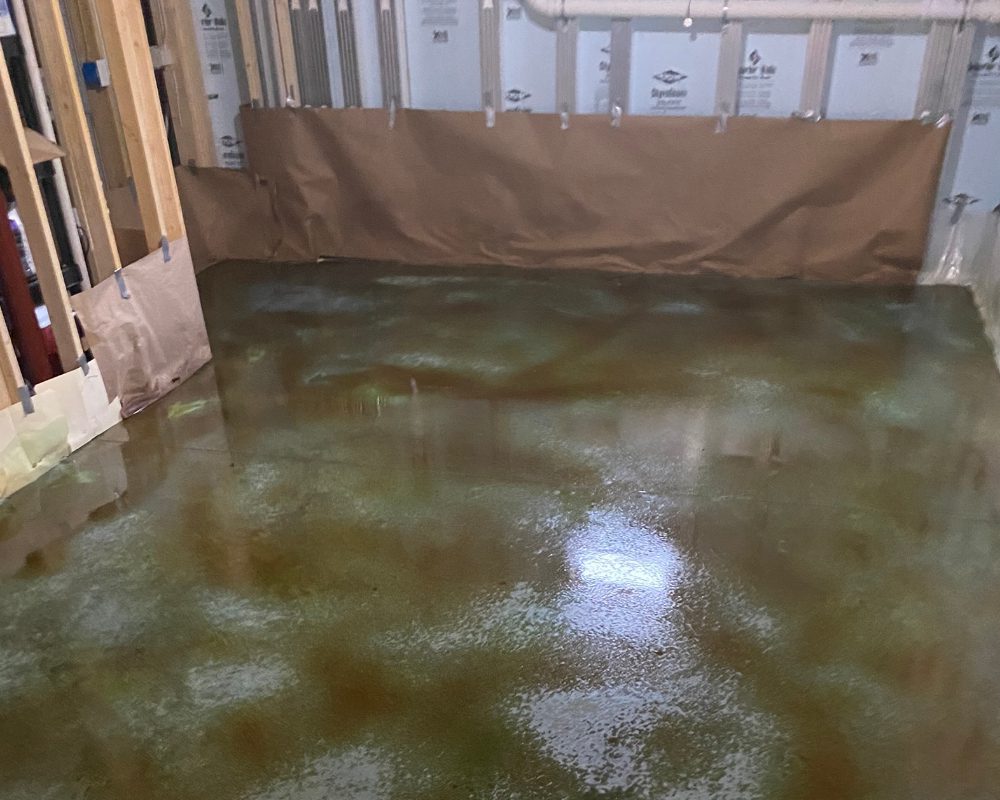 Application of Coffee Brown acid stain, creating a mottled effect on the Azure Blue base