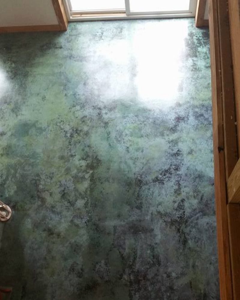The fully cured and sealed floor, displaying a beautiful transition from initial uniform turquoise to rich, complex patterns