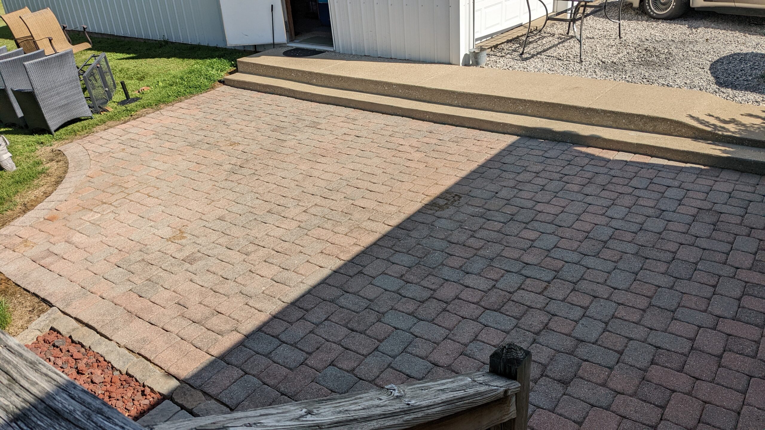 Faded concrete paver patio