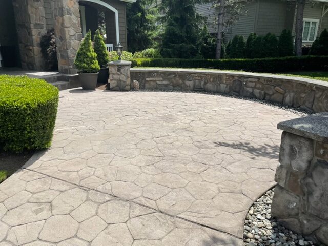 Faded stamped concrete walkway