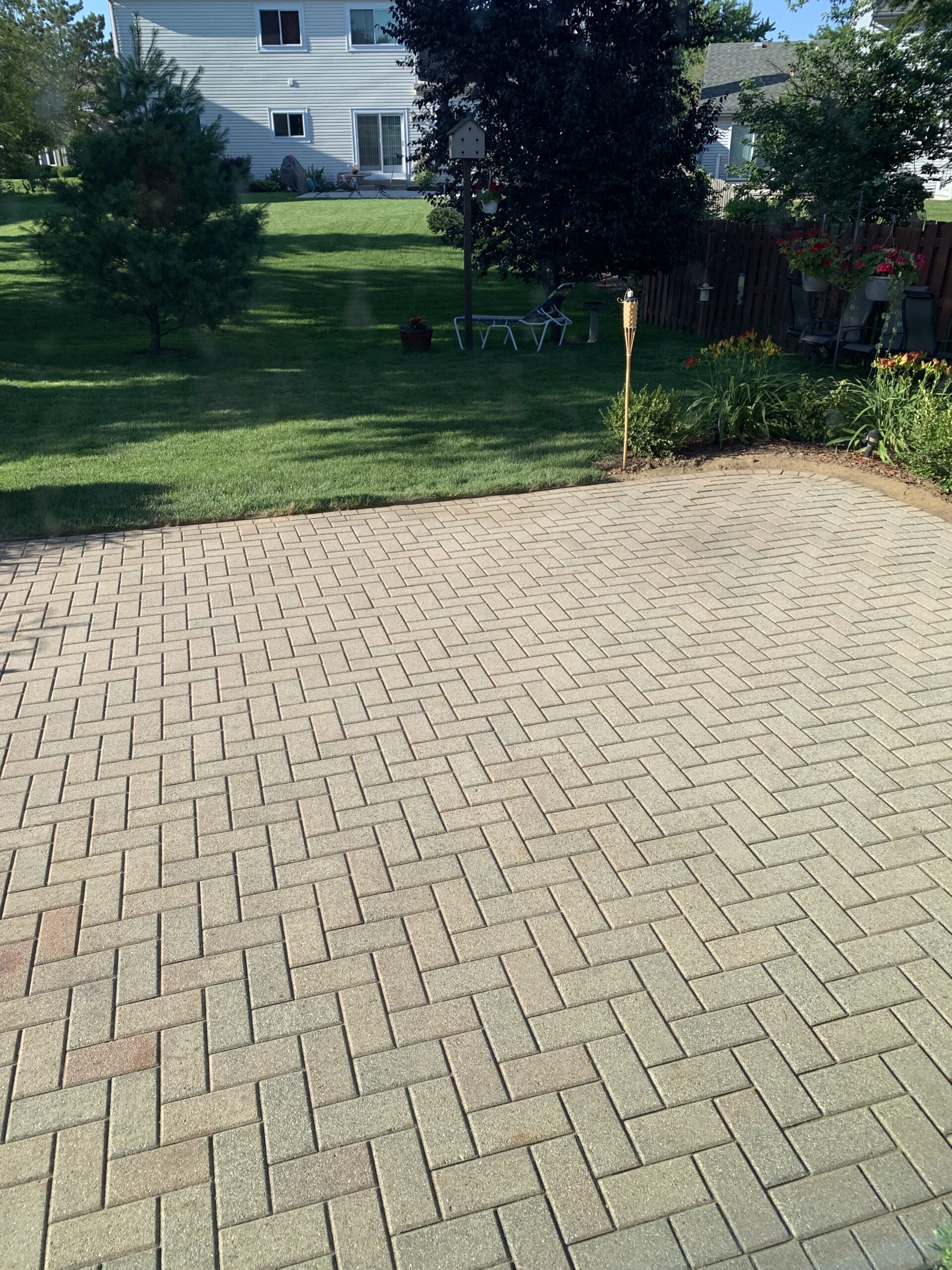 Old faded concrete patio pavers