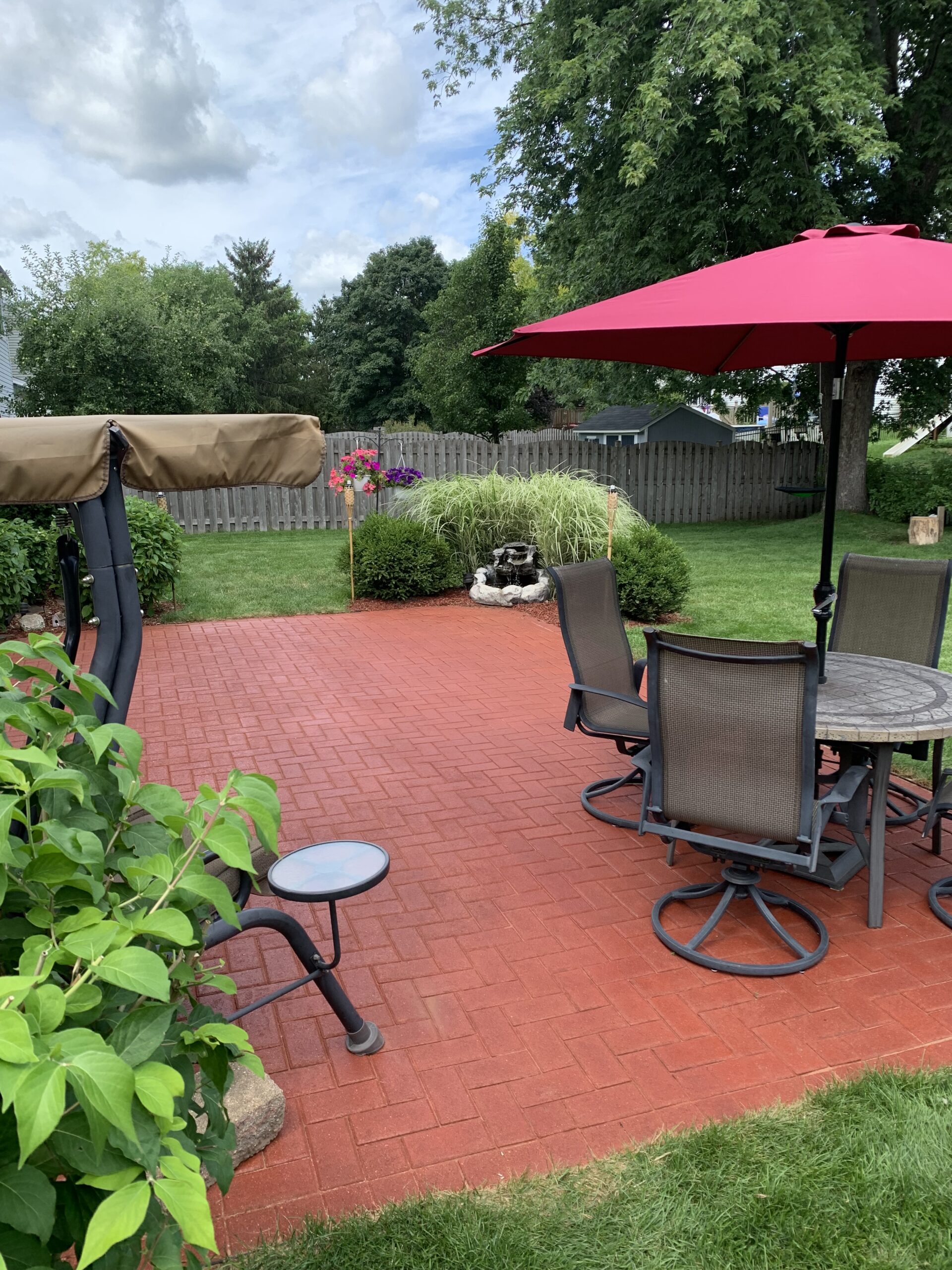 Crimson red concrete patio paver stain