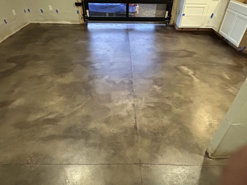 Apartment with EverStain black acid stained concrete floor