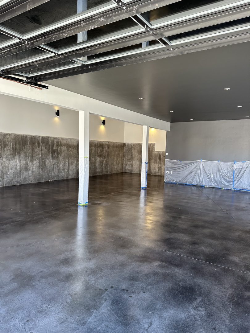 Garage Floor Transformed: Post-Antiquing™ Black Stain and Sealing