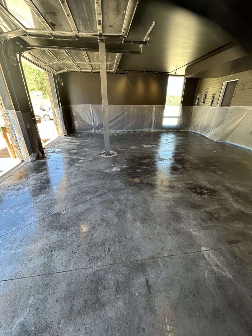 Freshly Applied Antiquing™ Black Stain on Garage Floor