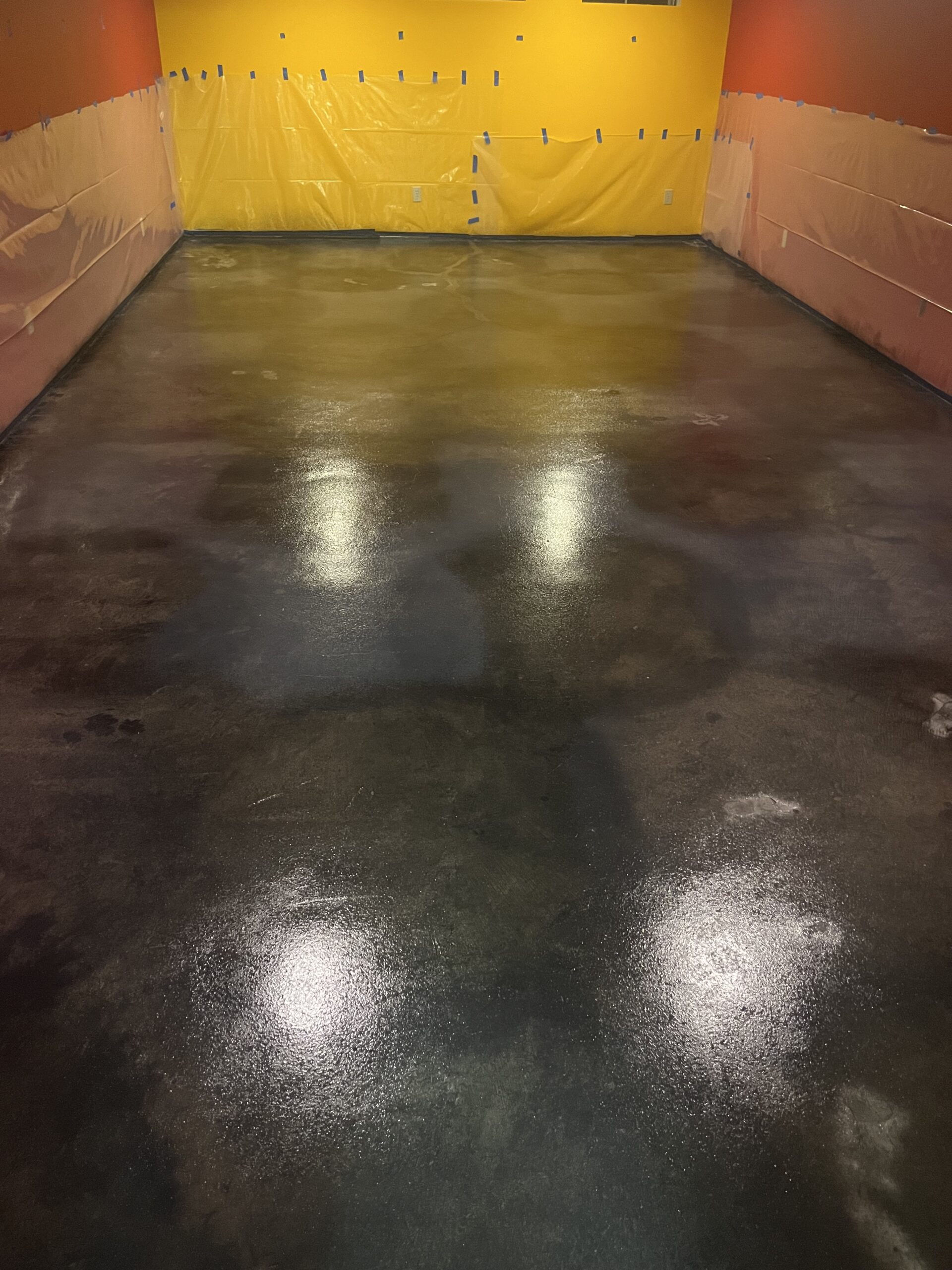 Monochrome floor showcasing a fusion of black and steel grey stains