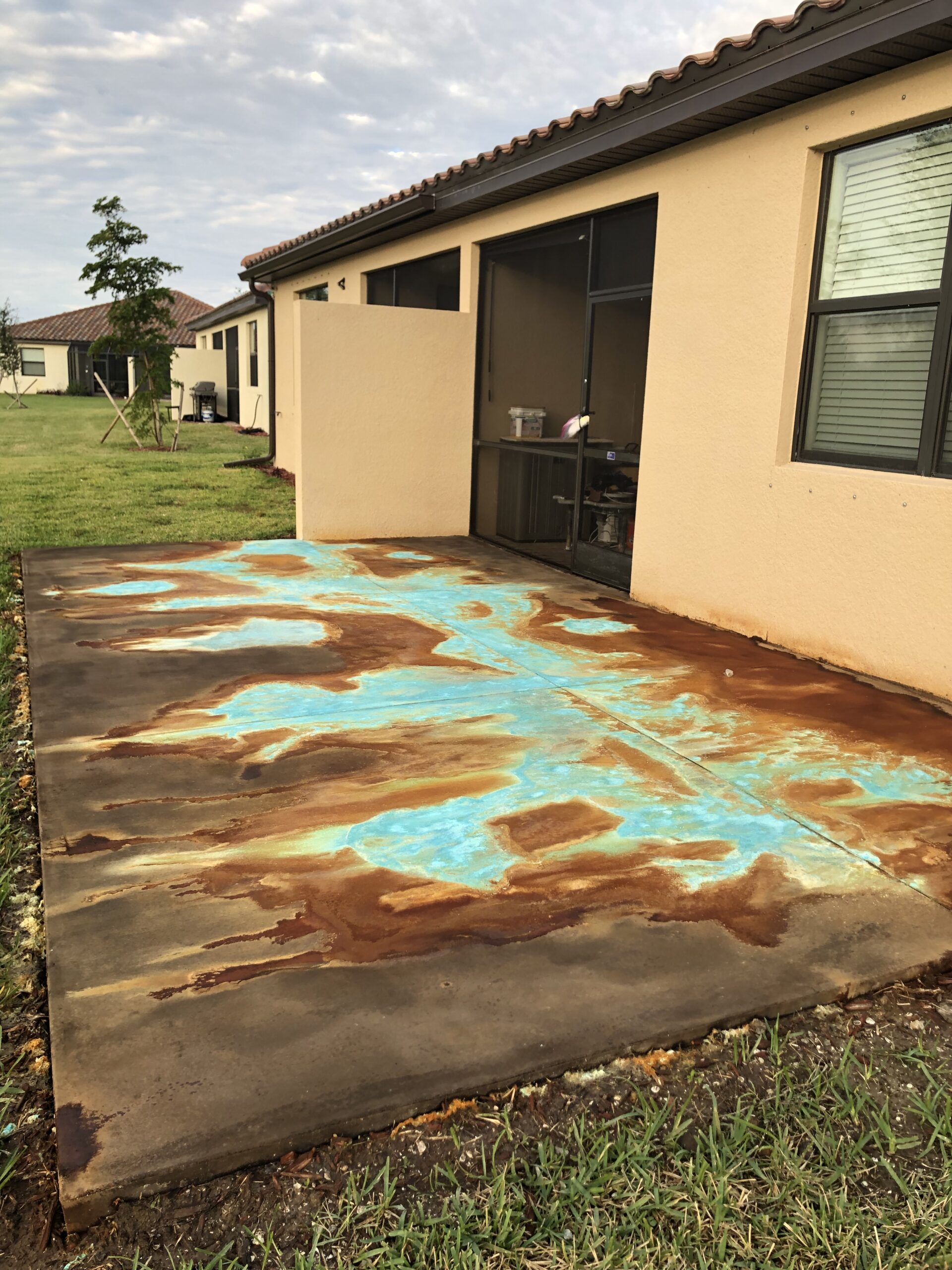 Flowing water-color vein concrete veining technique acid stain with Azure Blue acid stain and Miracle-Gro