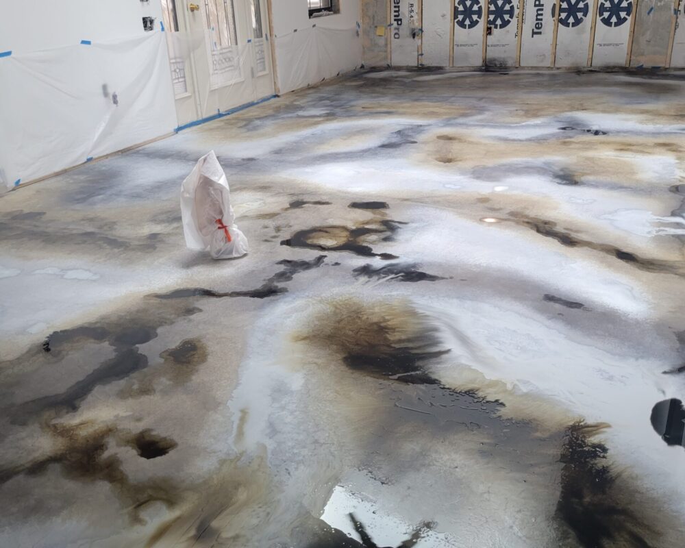 Iron Gray Accents Over Silver, White, and Stone Gray ColorWave on Concrete Floor