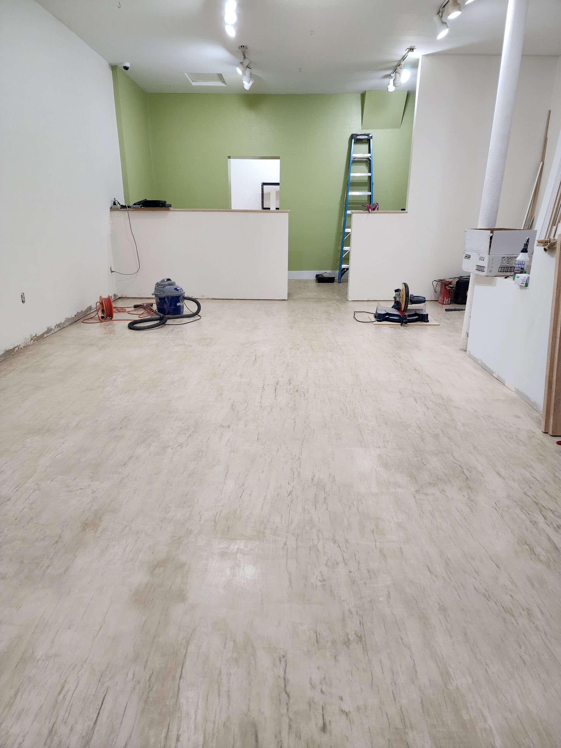 Artistic woodgrain effect achieved by skillfully troweling and burnishing the textured top coat.