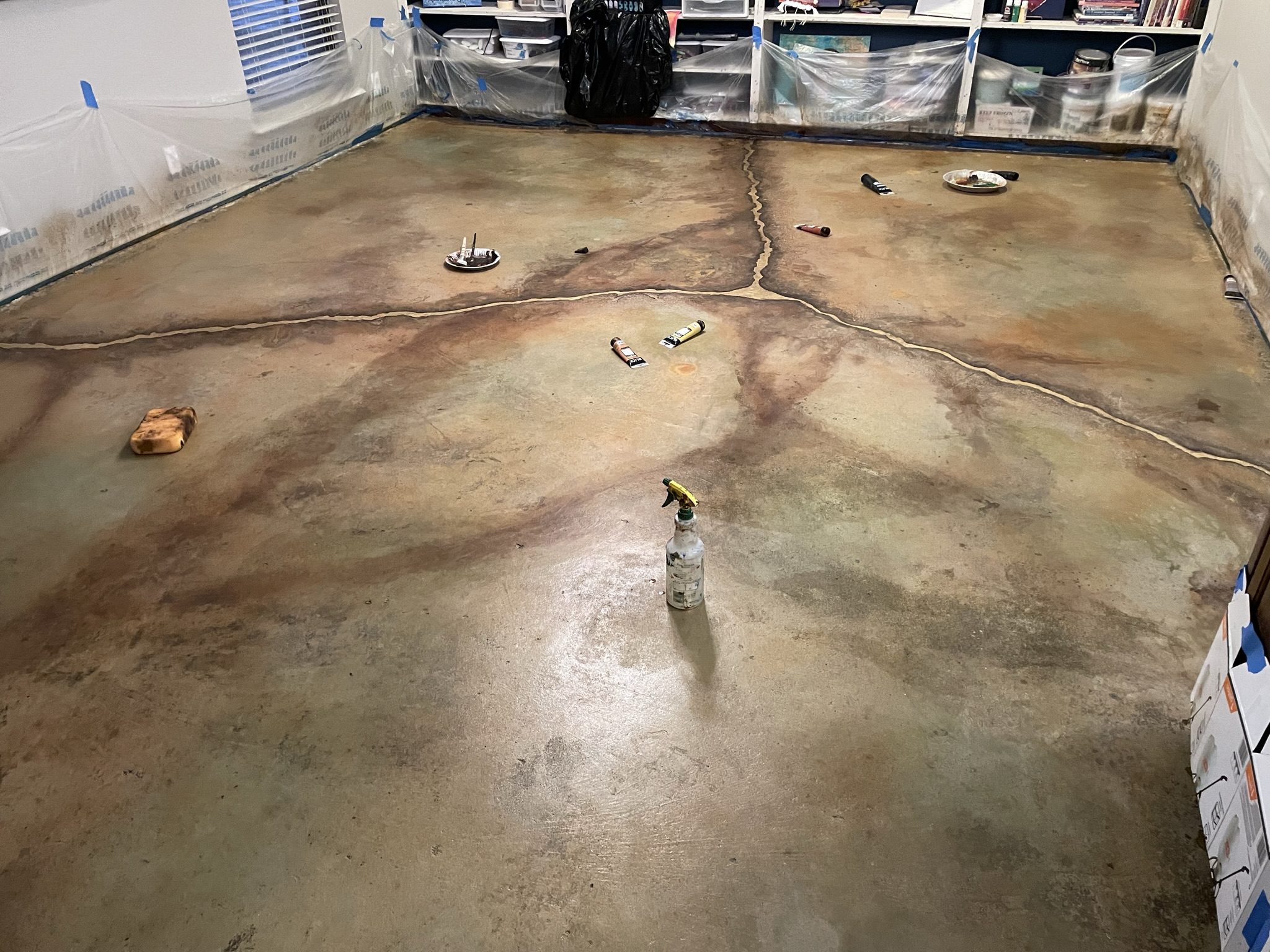 An image capturing the floor after the addition of acrylic paints.