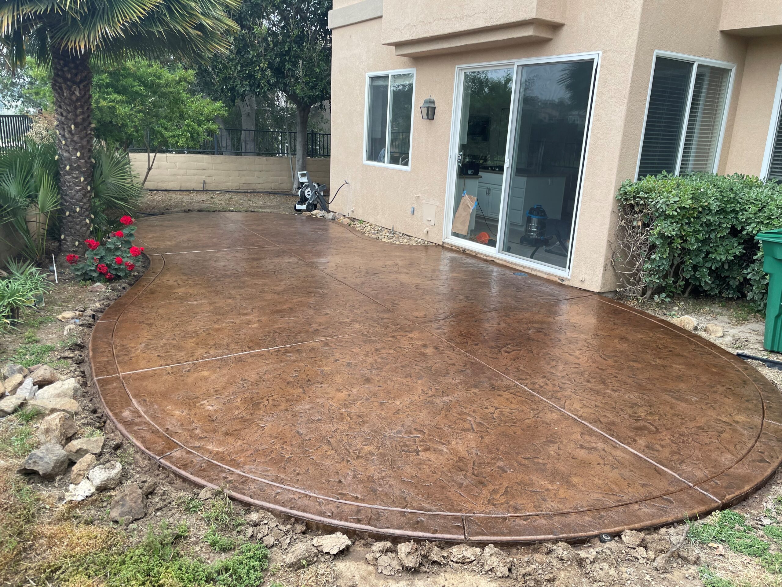 Another view of the sealed patio, highlighting the remarkable transformation.
