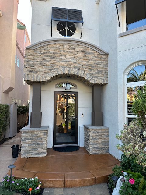 Front porch concrete colored with EasyTint cumin, showing a warm, inviting hue