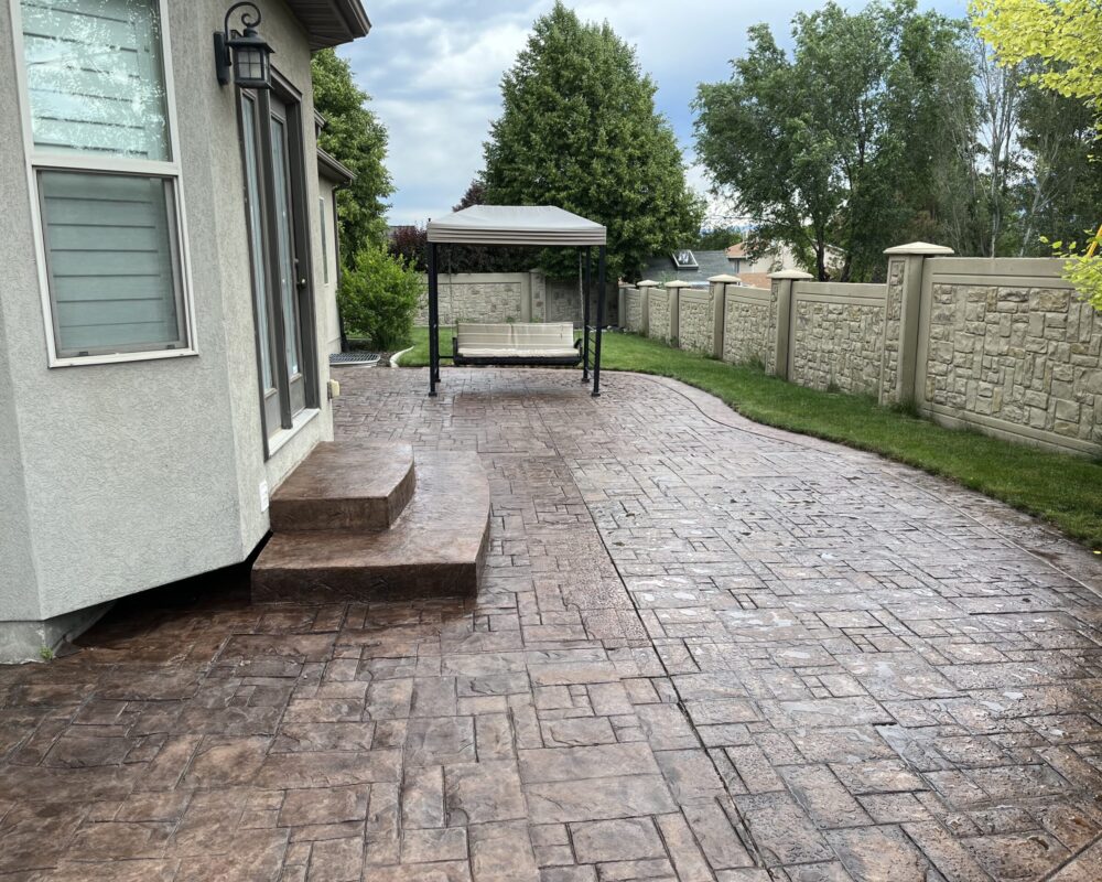 Revived stamped concrete after application of Chocolate EasyTint™ gloss