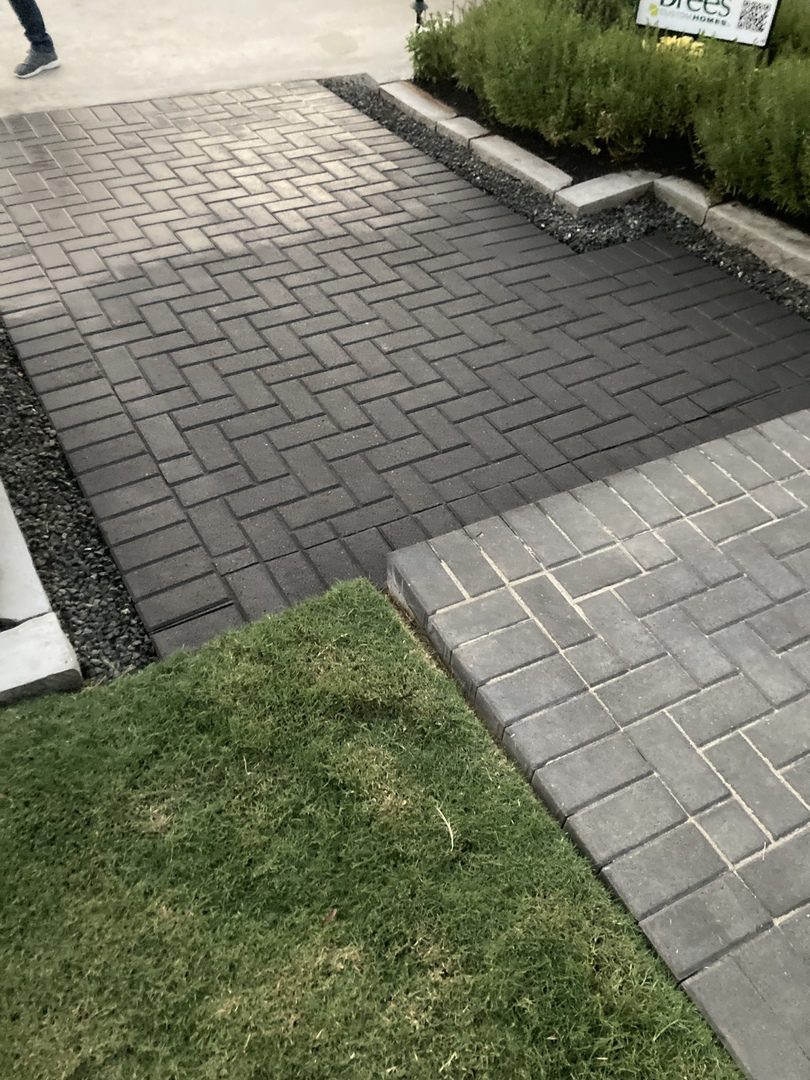 Half-stained concrete paver steps with Charcoal EasyTint™