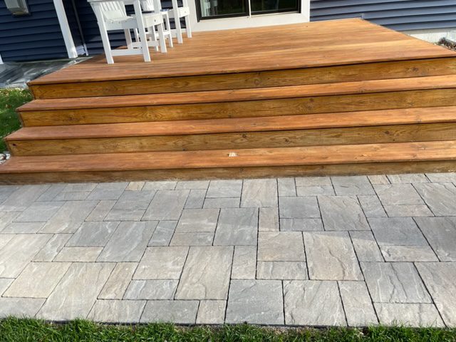 Unstained stamped concrete with its natural gray color and textured pattern