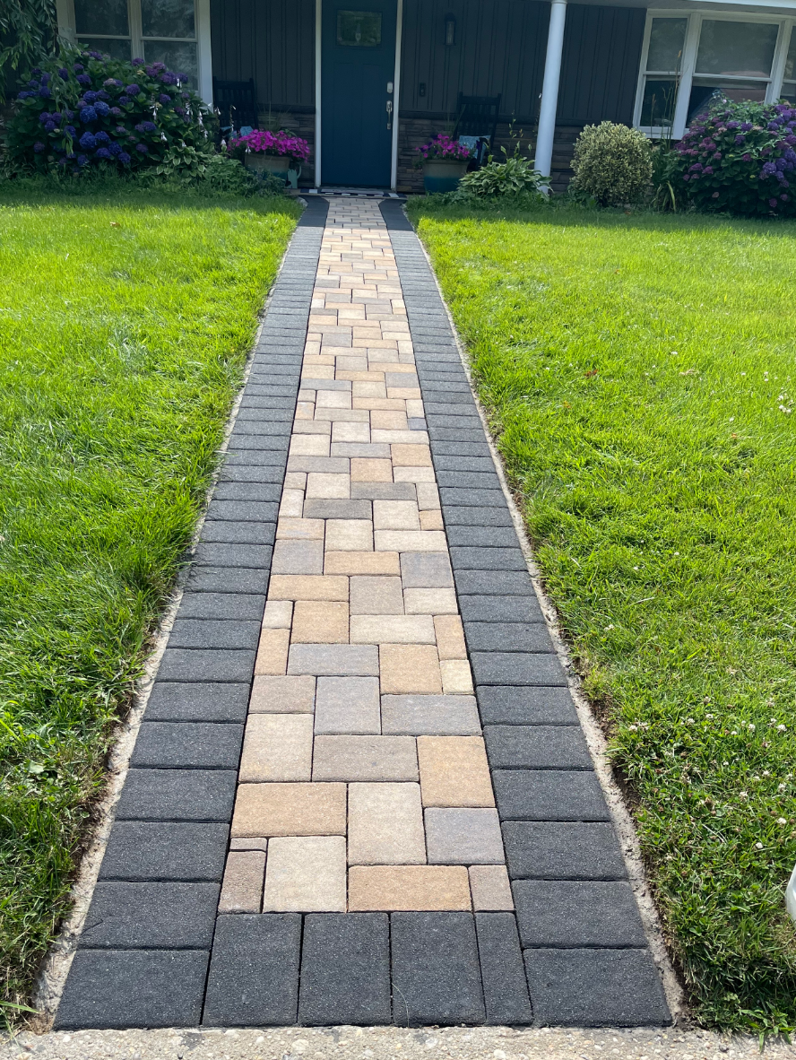 After renovation: Revitalized paver walkway stained with a blend of Buff, Charcoal, Khaki, and Silver Gray