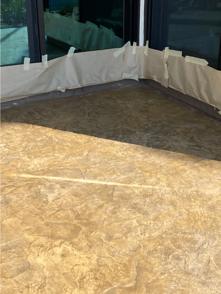 Patio after staining with Café Royale Antiquing™ Stain, revealing rich brown tones and texture.