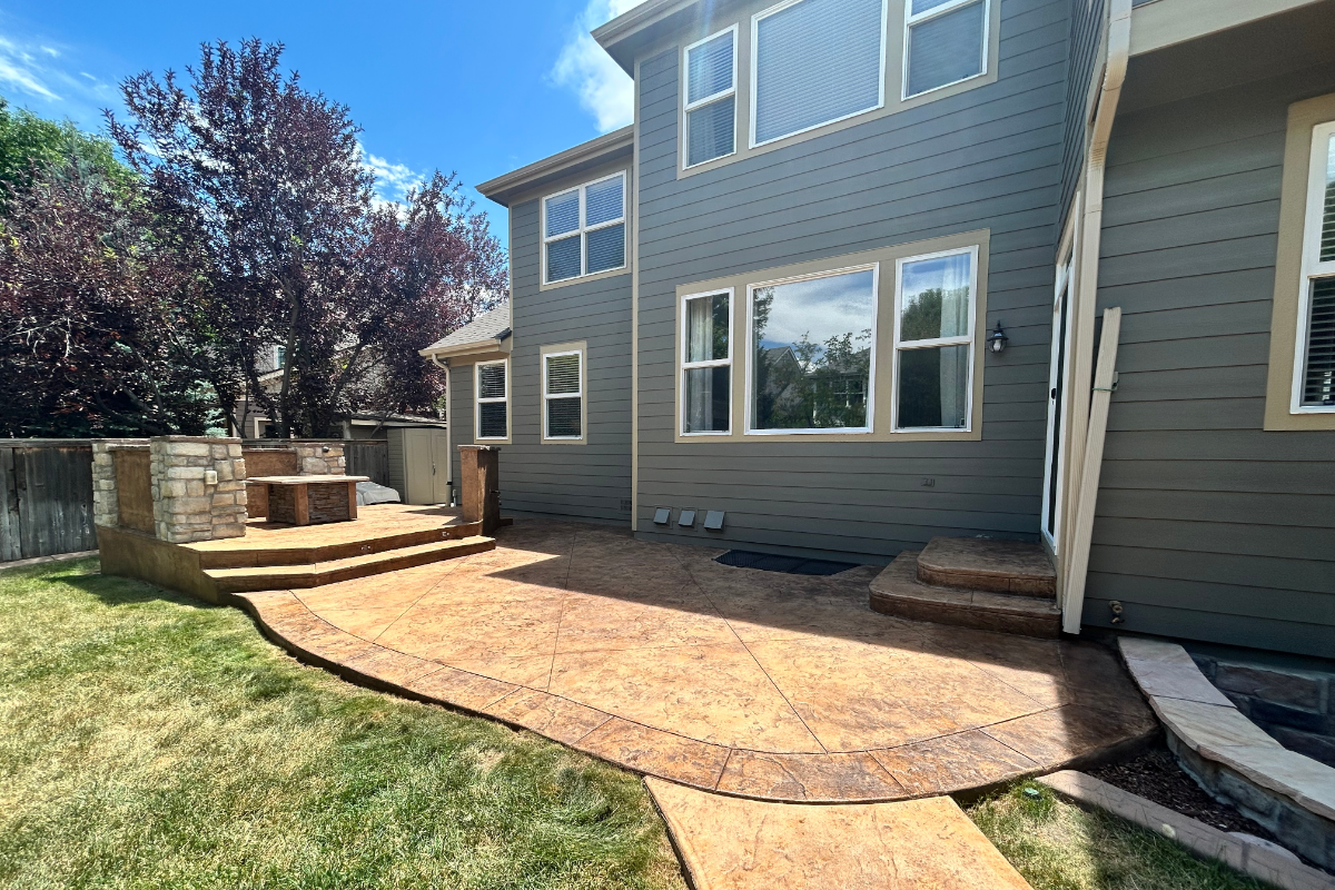 Stamped patio restored with Café Royale Antiquing™ Stain, showing rich brown tones and natural stone texture.
