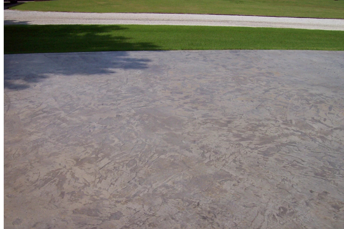 Auburn Antiquing stain finished stamped concrete driveway
