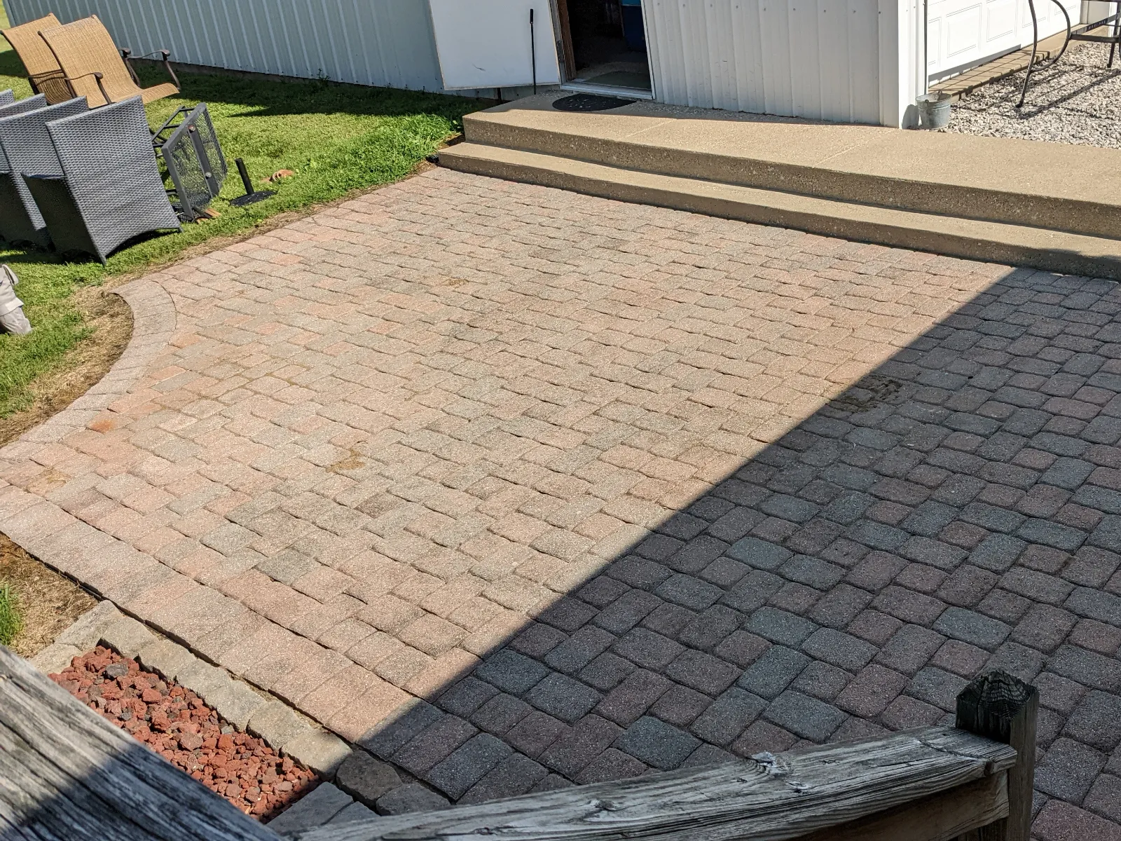 Faded 15-year-old concrete paver patio before applying Crimson and Eagle Gray Portico Stain.