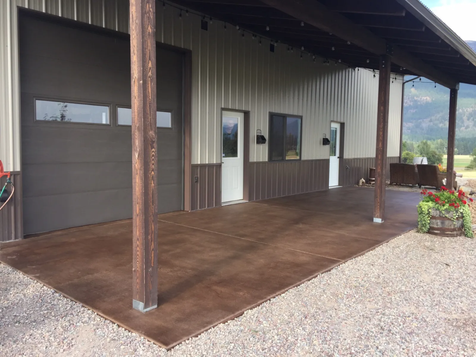 Smooth pole barn concrete patio transformed with rich brown Driftwood Antiquing Stain